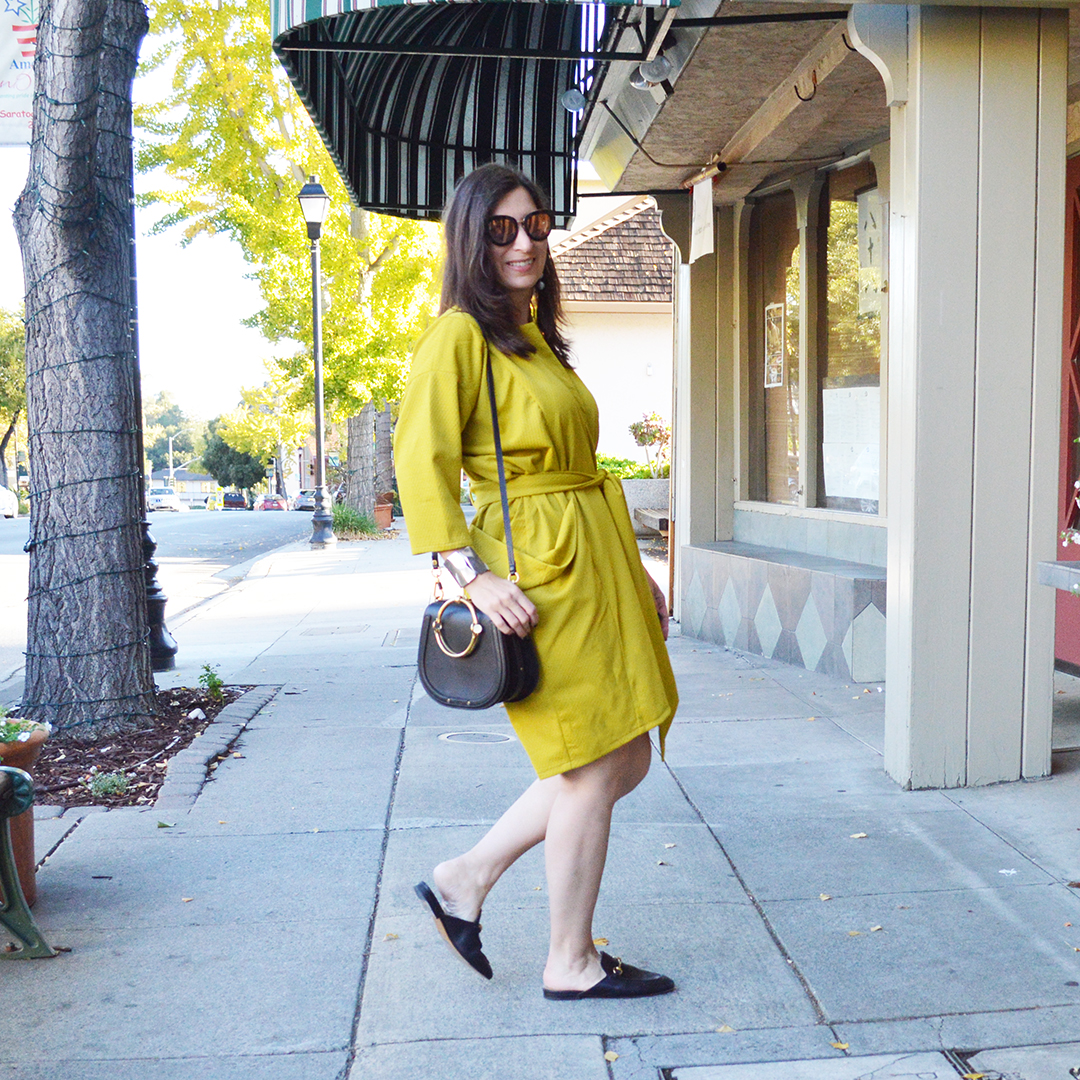 black dress with mustard shoes